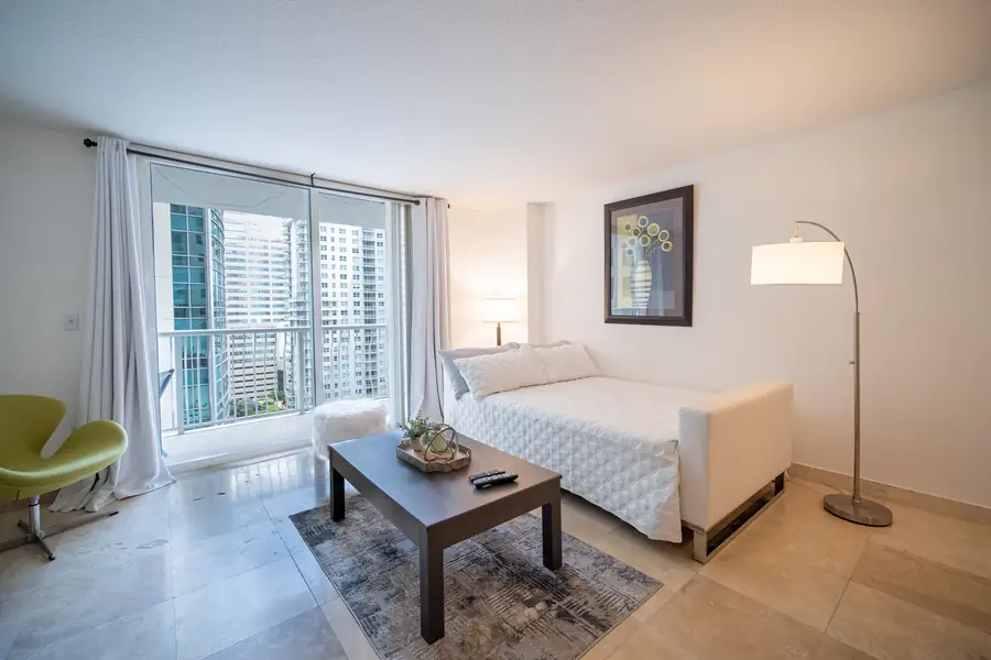 Second bedroom suite with desk and city outlook