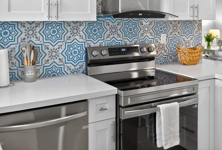 Kitchen detail with patterned tile backsplash